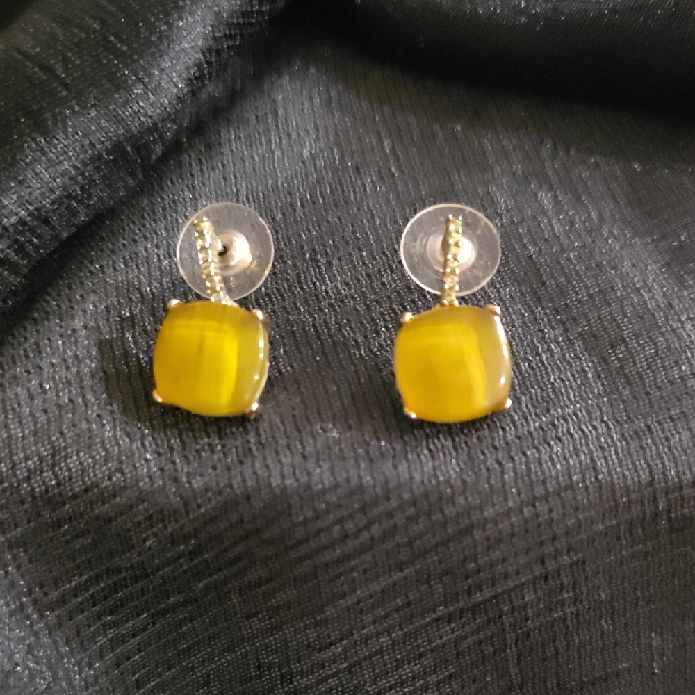 yellow cushion-cut stud earrings with a post-back closure